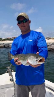 Captain Jared with a Trout