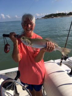 Woman Holding a Trout