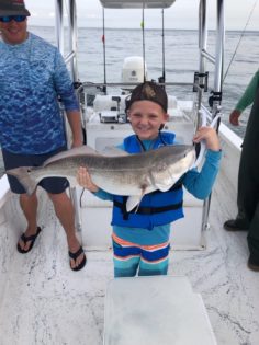 Young boy with Red Fish